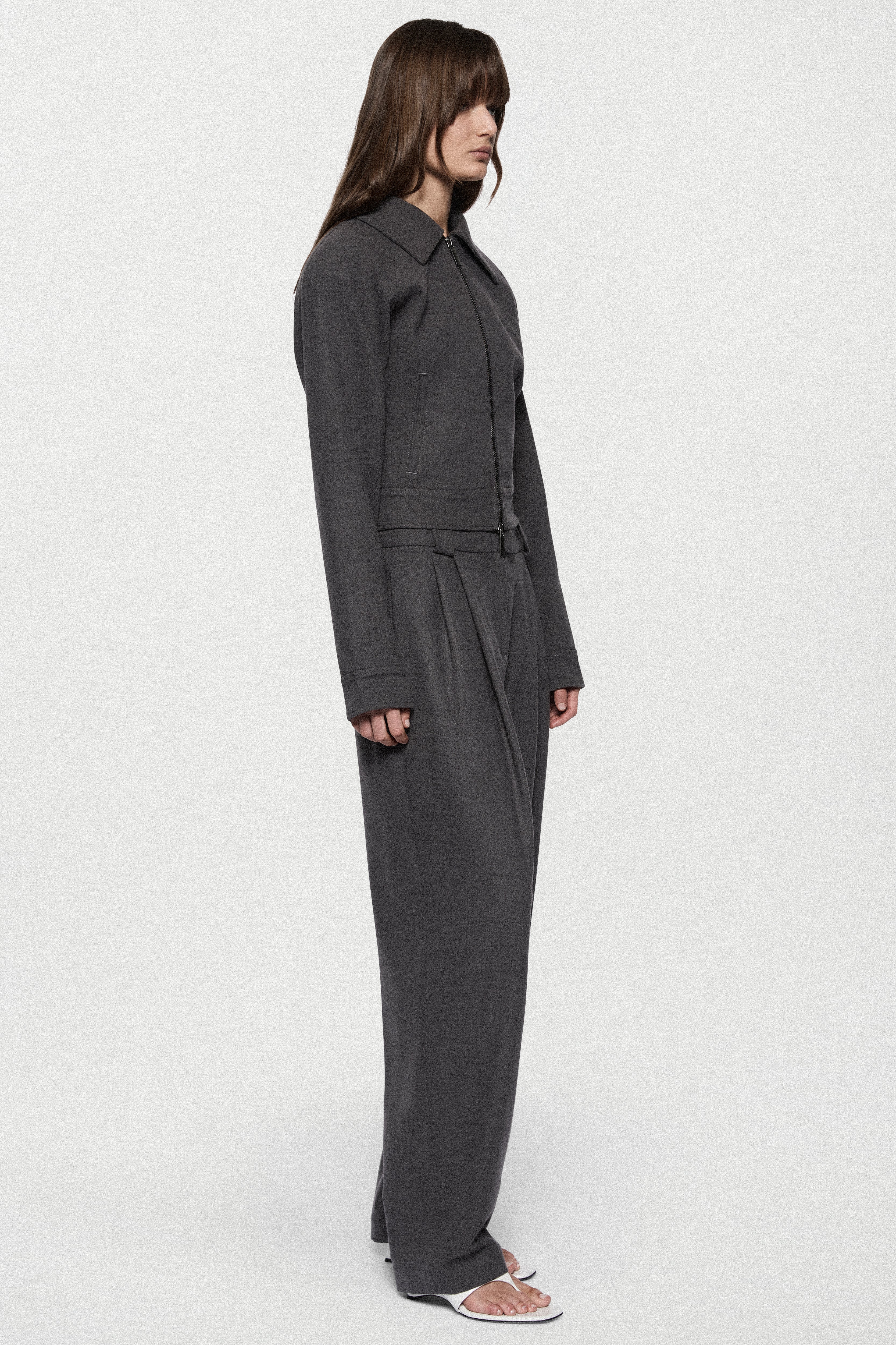 Charcoal tailored trousers with long straight legs and side pockets