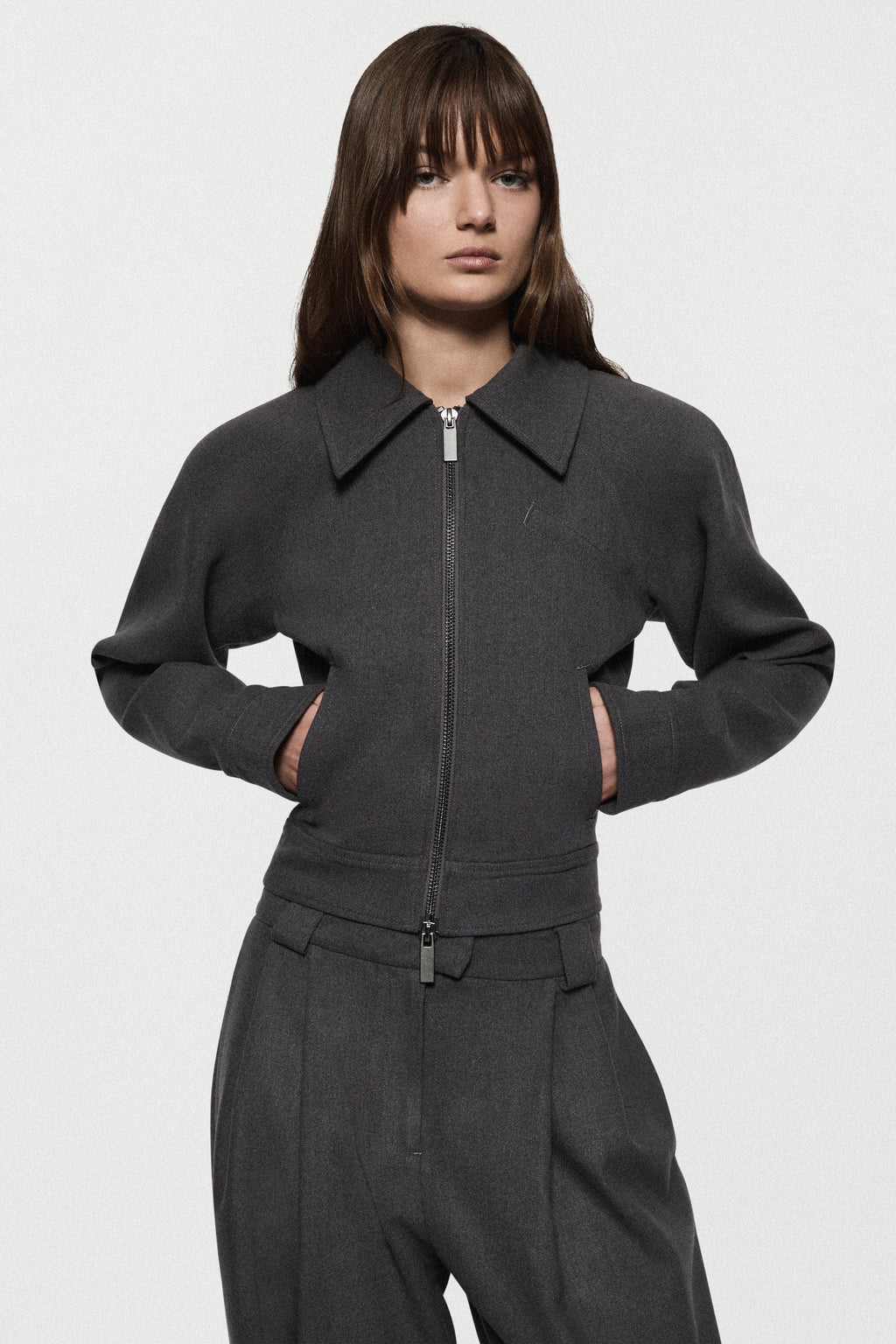 Charcoal tailored bomber jacket with pointed collar and center-front zipper, side pockets