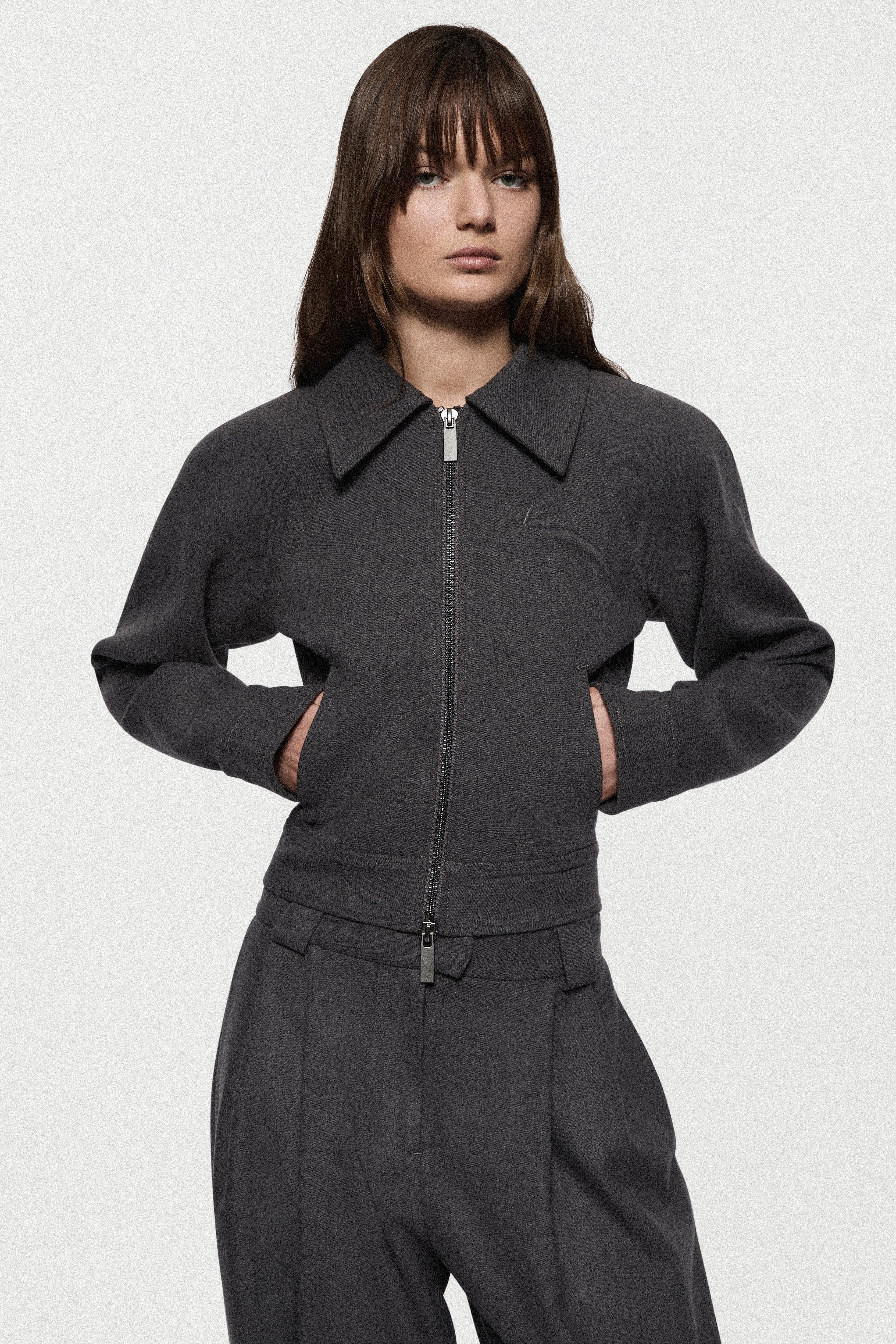 Charcoal tailored bomber jacket with pointed collar and center-front zipper, side pockets