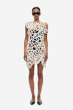 Ivory crochet mini dress with openwork lattice pattern and sleeveless cut