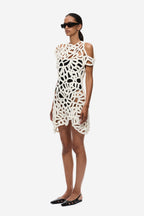 Ivory crochet mini dress with sleeveless openwork design and scalloped hem