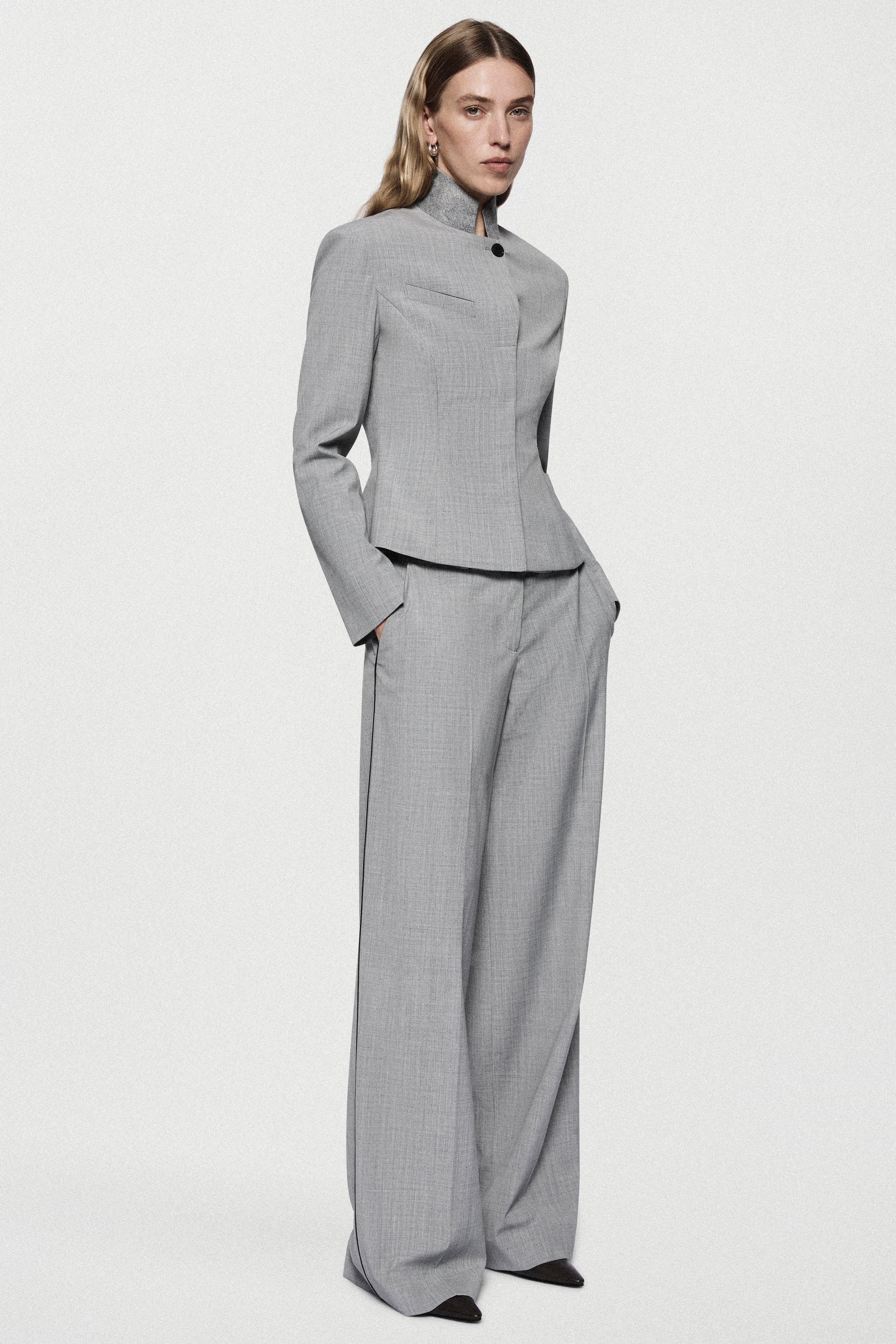 Melange grey wide-leg trousers with contrast piping and side pockets