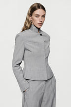 Melange grey trousers with contrast piping at waistband and front seam