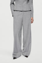 Melange grey wide-leg trousers with contrast piping, relaxed straight legs