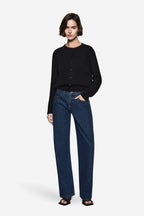 Black button-front knit cardigan, long sleeves, ribbed neckline and cuffs