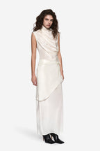 Off-white sleeveless silk top with high cowl neckline and asymmetric drape hem