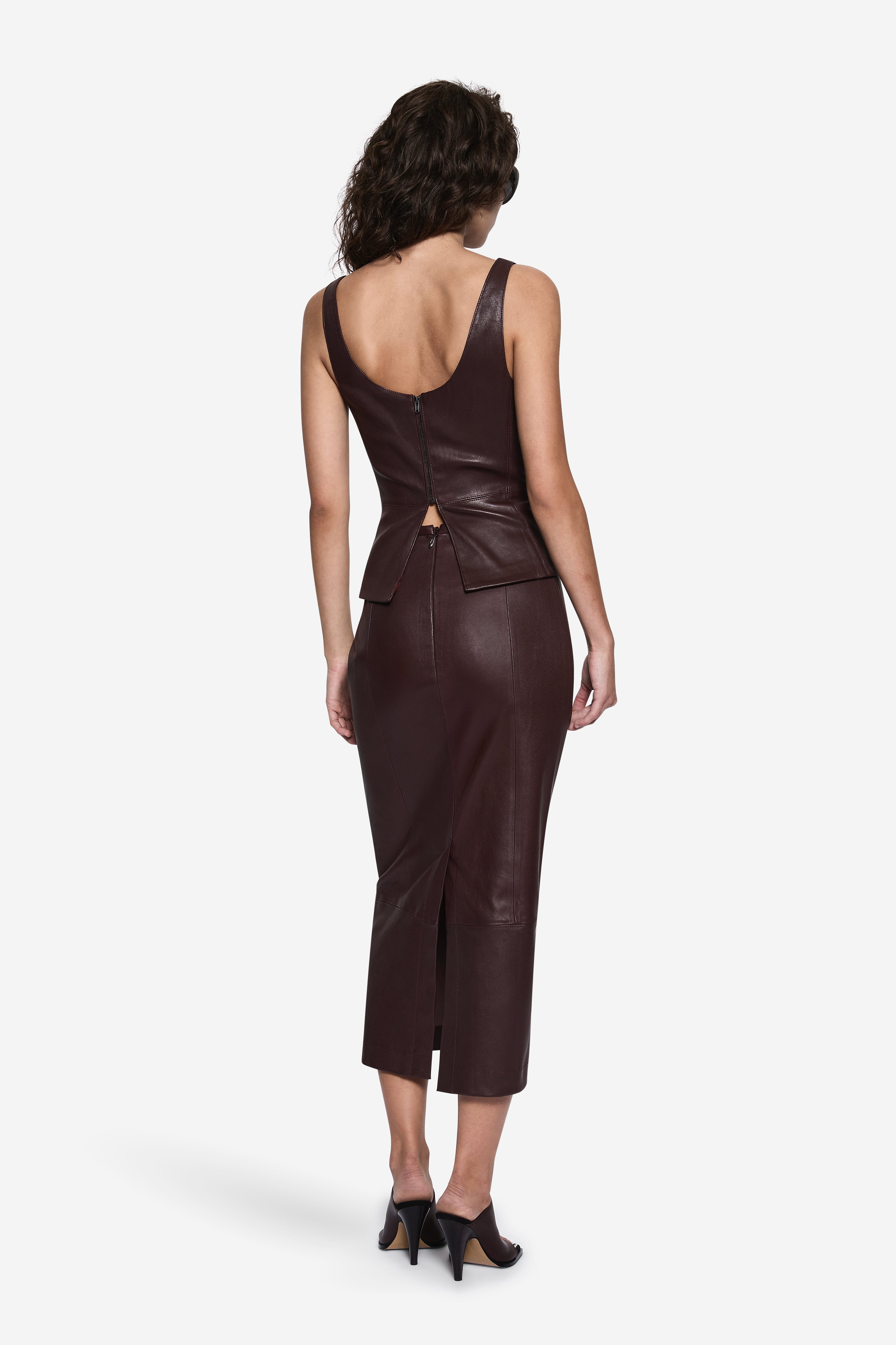 Dark brown stretch leather top with scoop back and center back seam detail