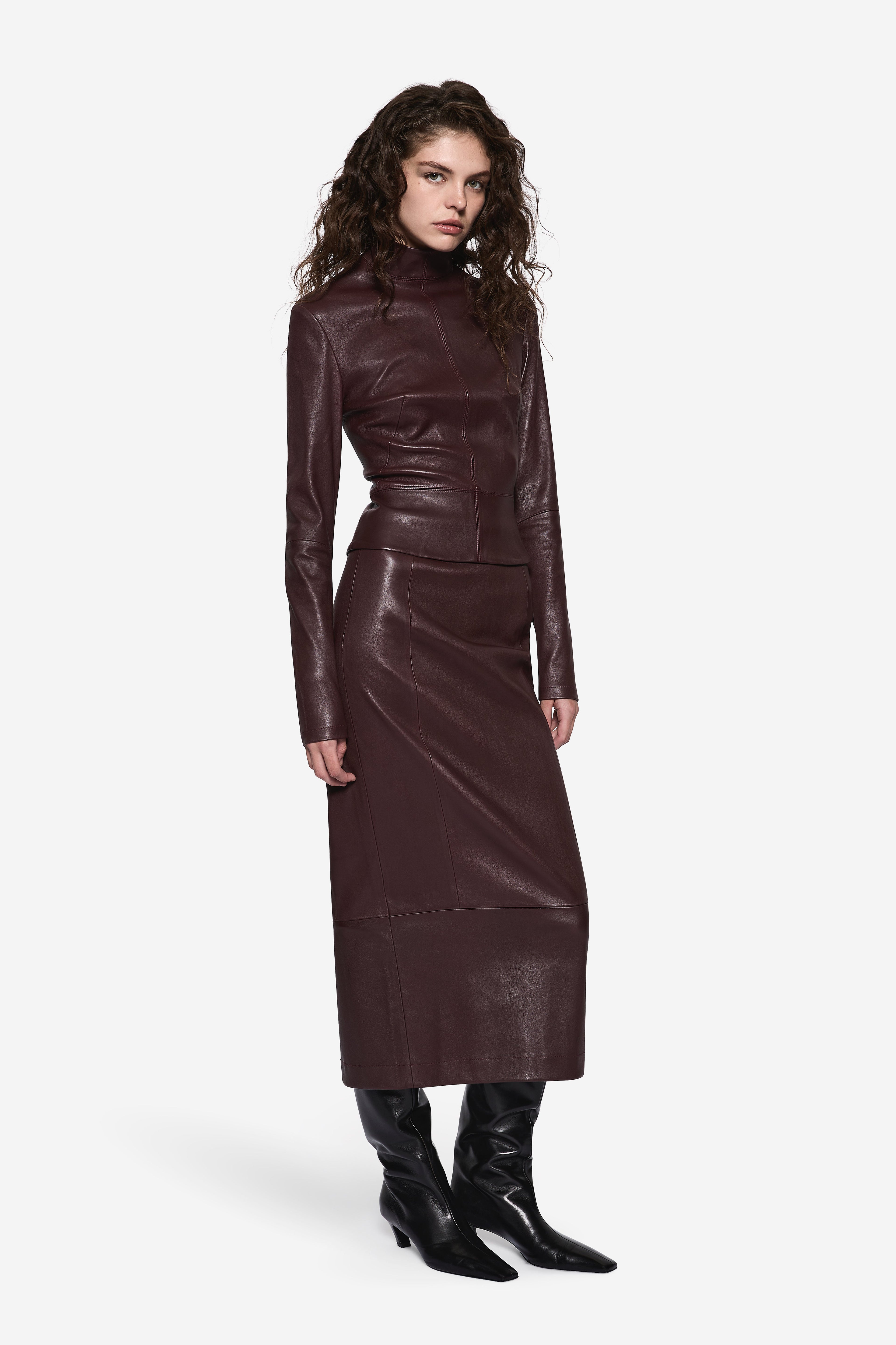 Bitter chocolate leather long-sleeve top with high neck and fitted, shaped waist