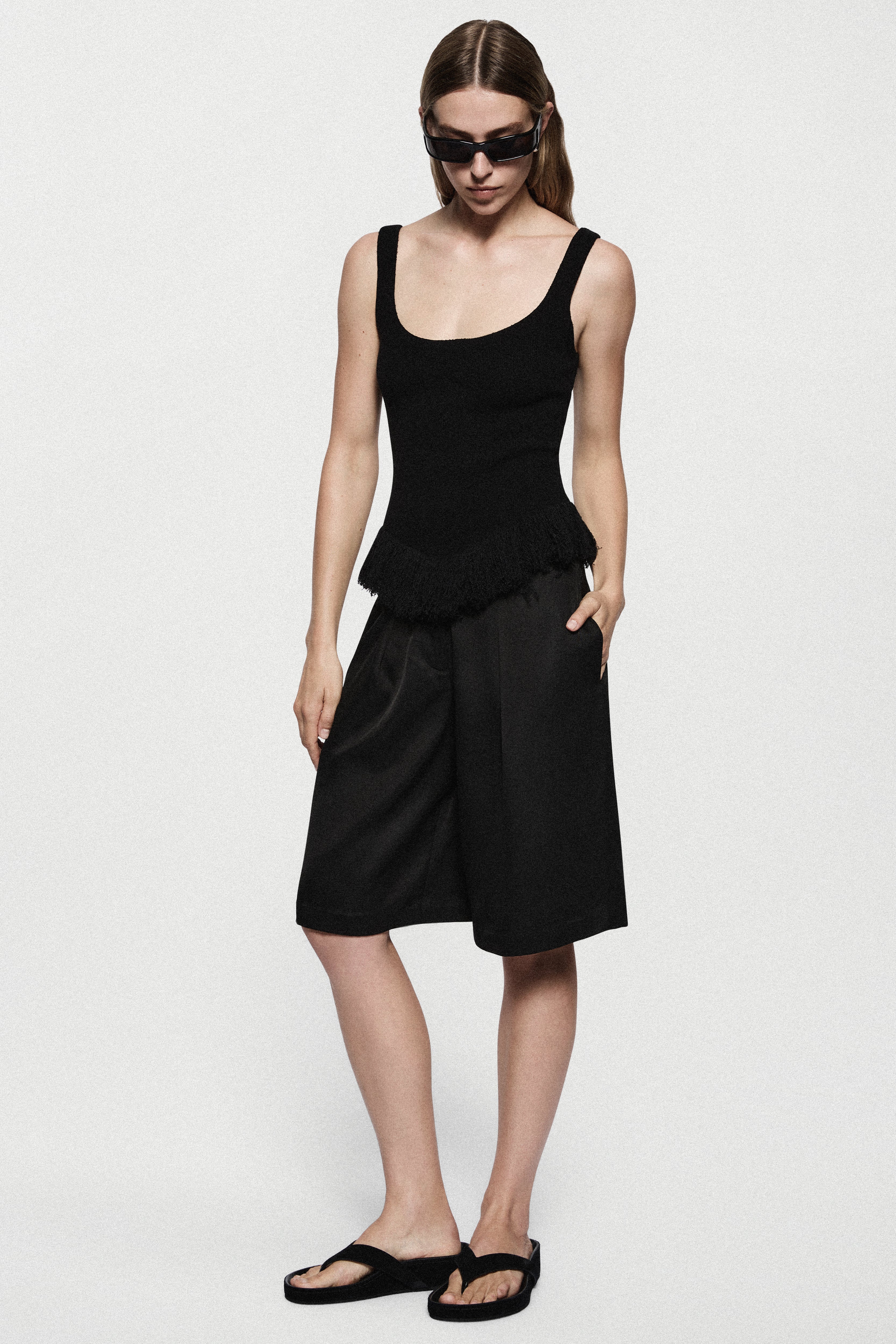 Black twill acetate shorts with relaxed fit and side pockets, above-knee length
