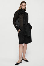 Black silk organza blouse with high neck bow tie and long sleeves