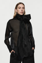 Black silk organza blouse, oversized bow collar and sheer long sleeves