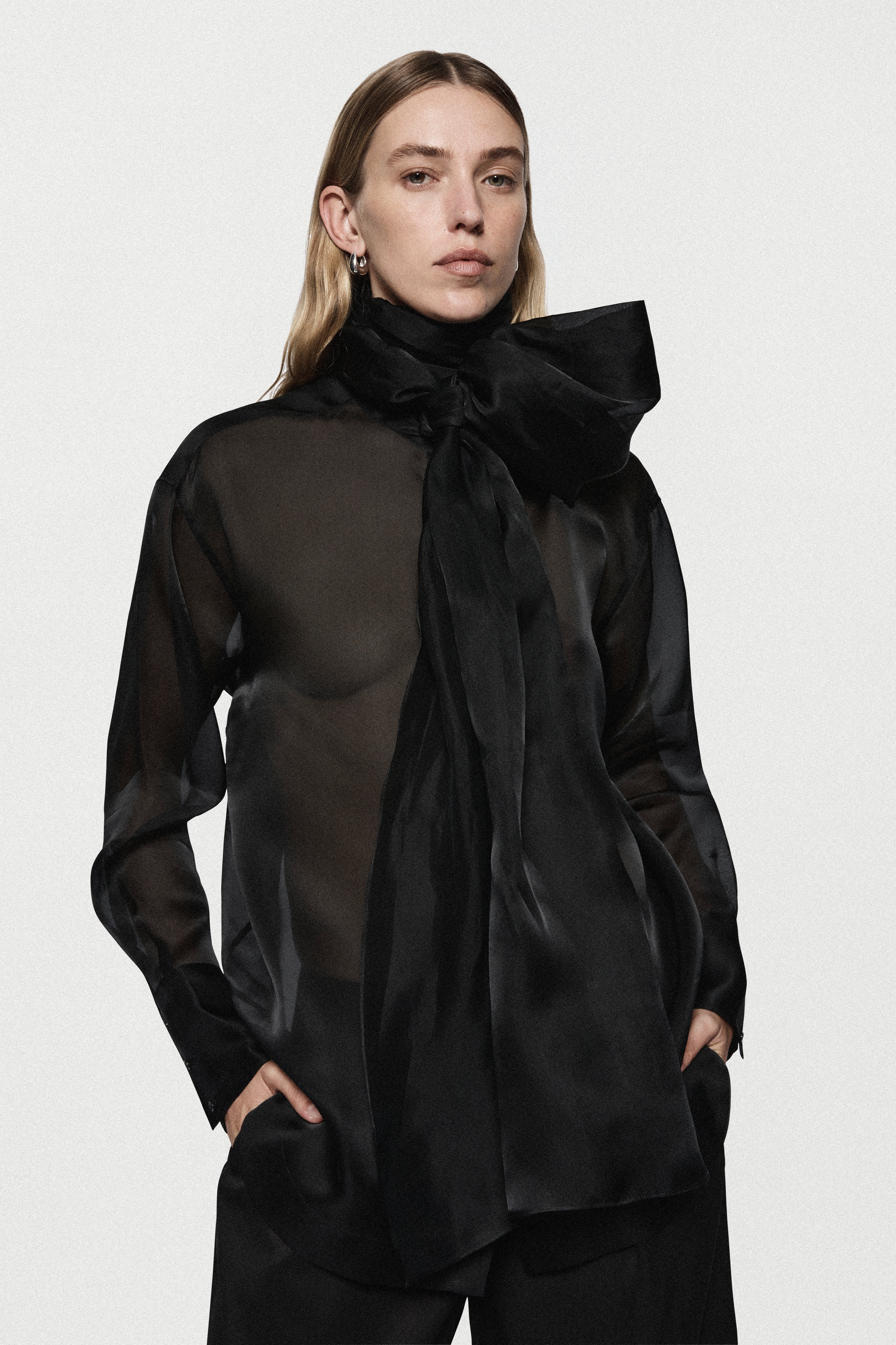 Black silk organza blouse, oversized bow collar and sheer long sleeves