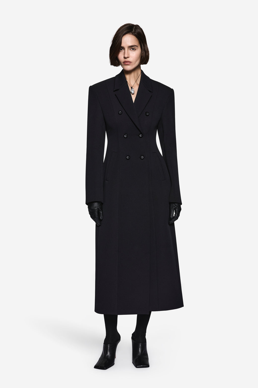 Black long notch-collar coat with double-breasted button front and long sleeves
