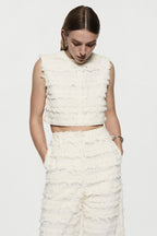 Winter white cotton fringe pants with ruffled tiers and wide waistband