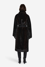 Back view of leopard-pattern fur coat with hood and belted waist