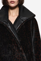 Fur coat lapels with black leather-trim collar detail