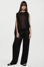 Black sheer sleeveless silk blouse with high neck and relaxed draped fit