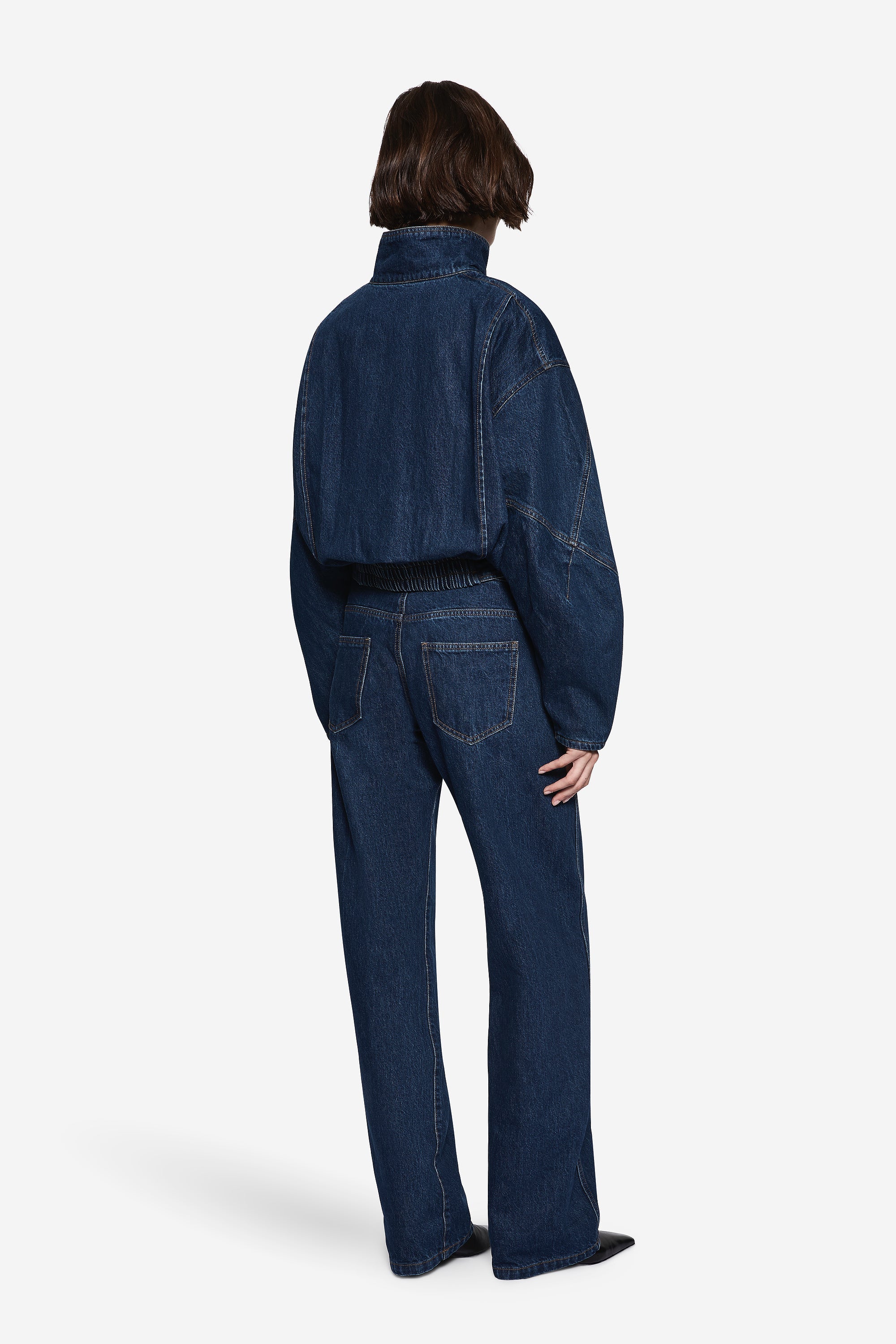 Back view vintage blue denim jacket with high neck, zip-front, cropped length