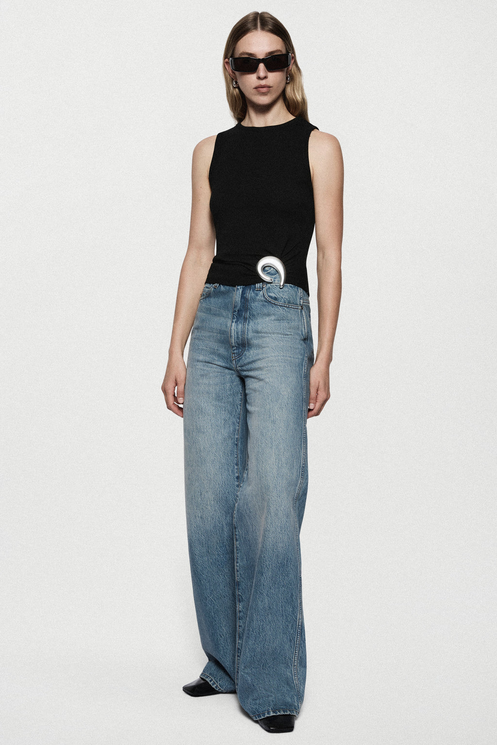 Black ribbed sleeveless tank top with crew neckline