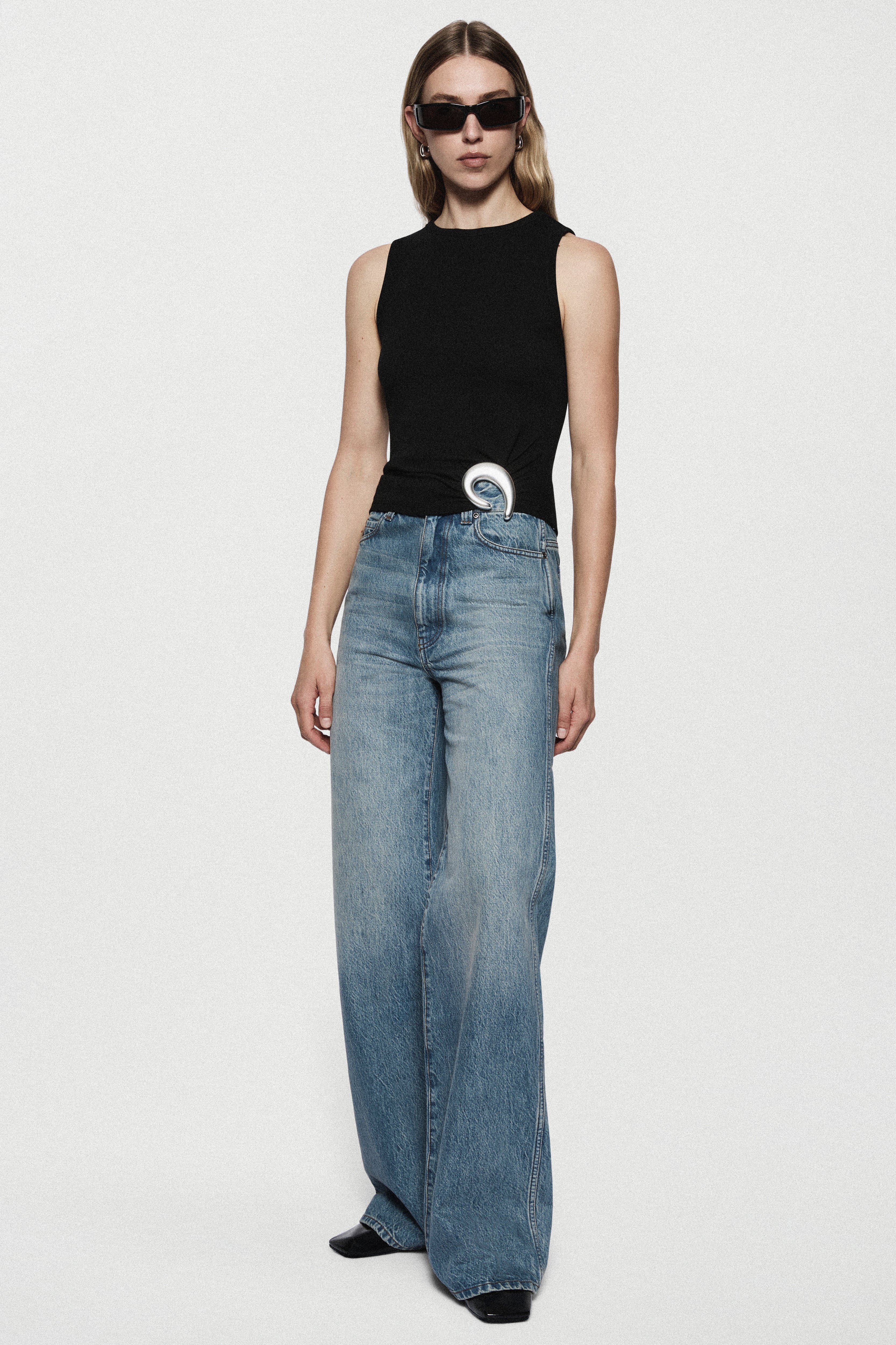 Black ribbed sleeveless tank top with crew neckline