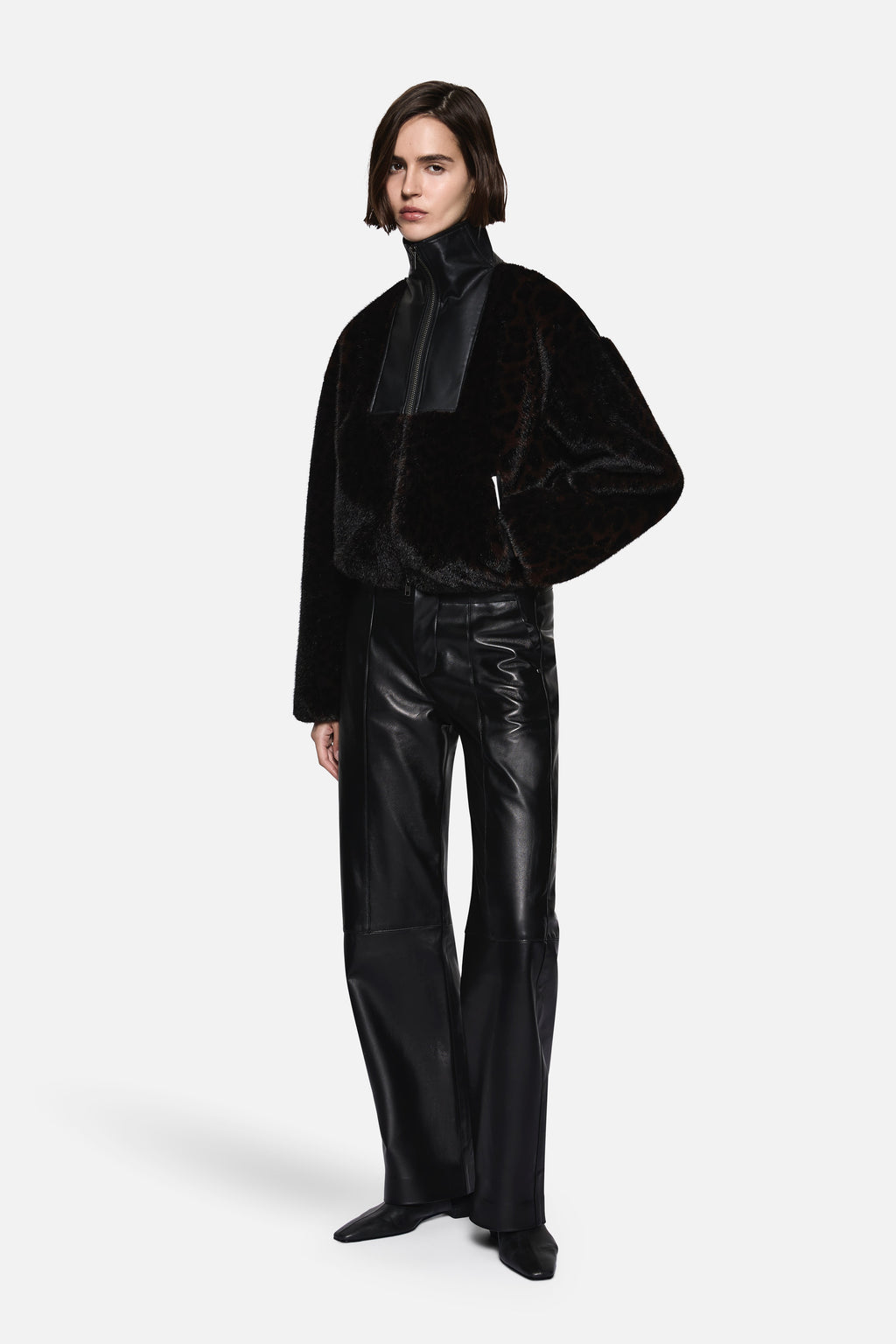 Black fur jacket with front zipper, stand collar, loose fit