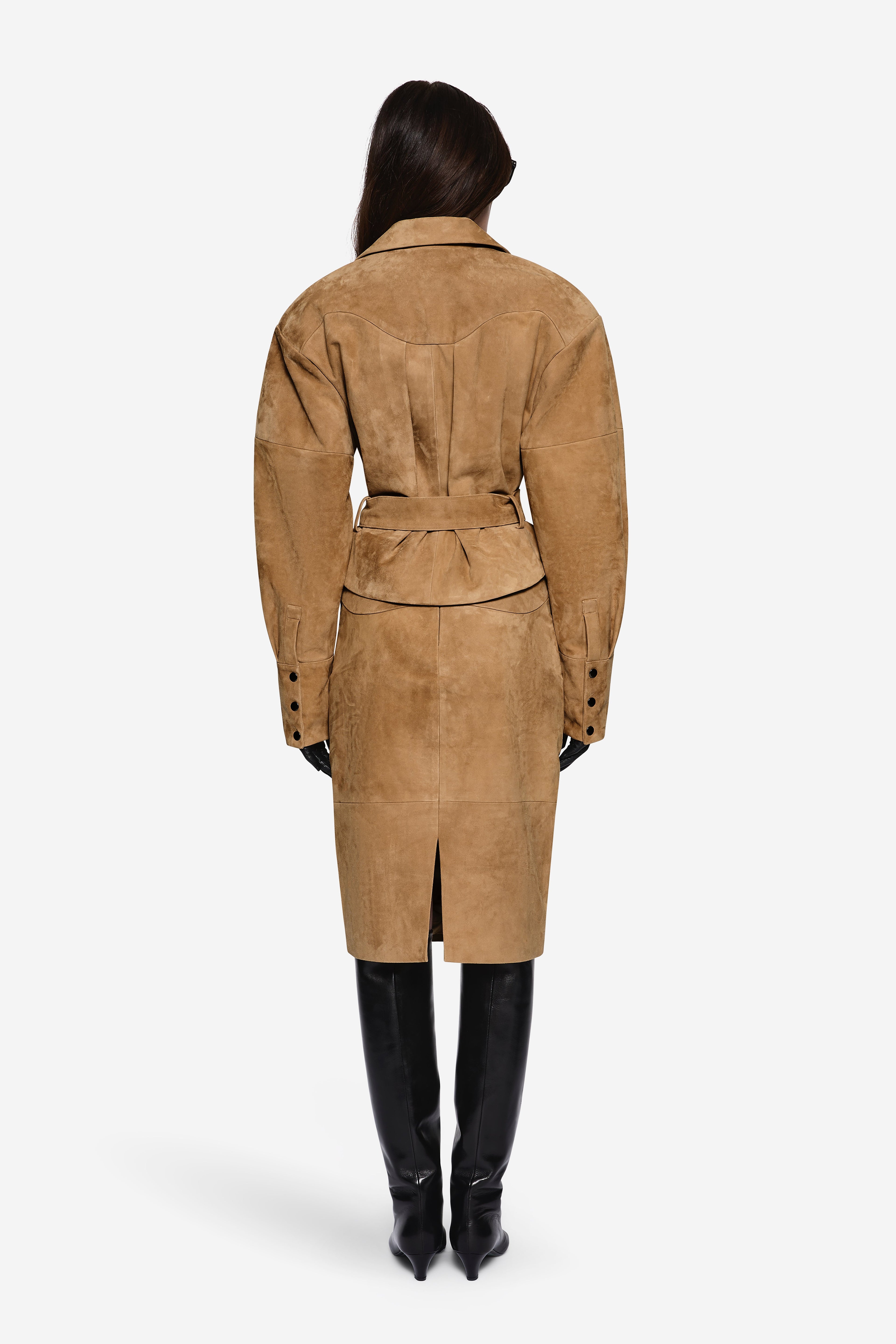 Back view of tan suede leather belted jacket with center back seam and shoulder yoke