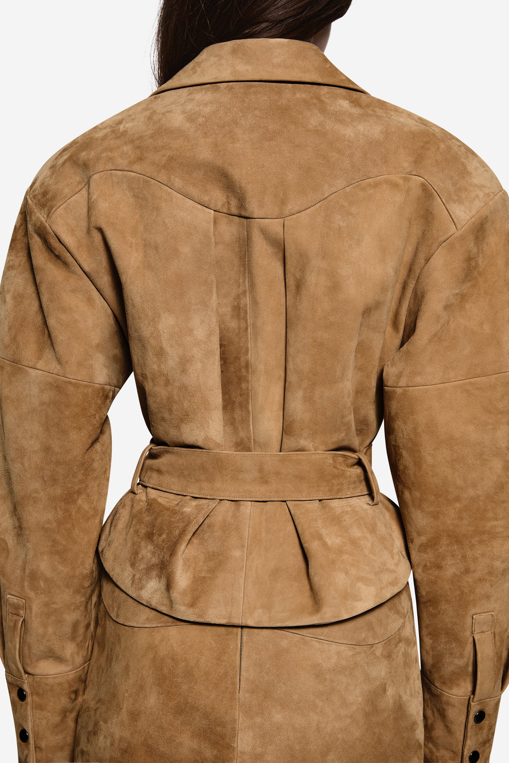 Back view of tan suede leather belted jacket with yoke seam and shoulder stitching