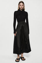 Black long-sleeve twist jersey top with ruched high neck and waistband seam