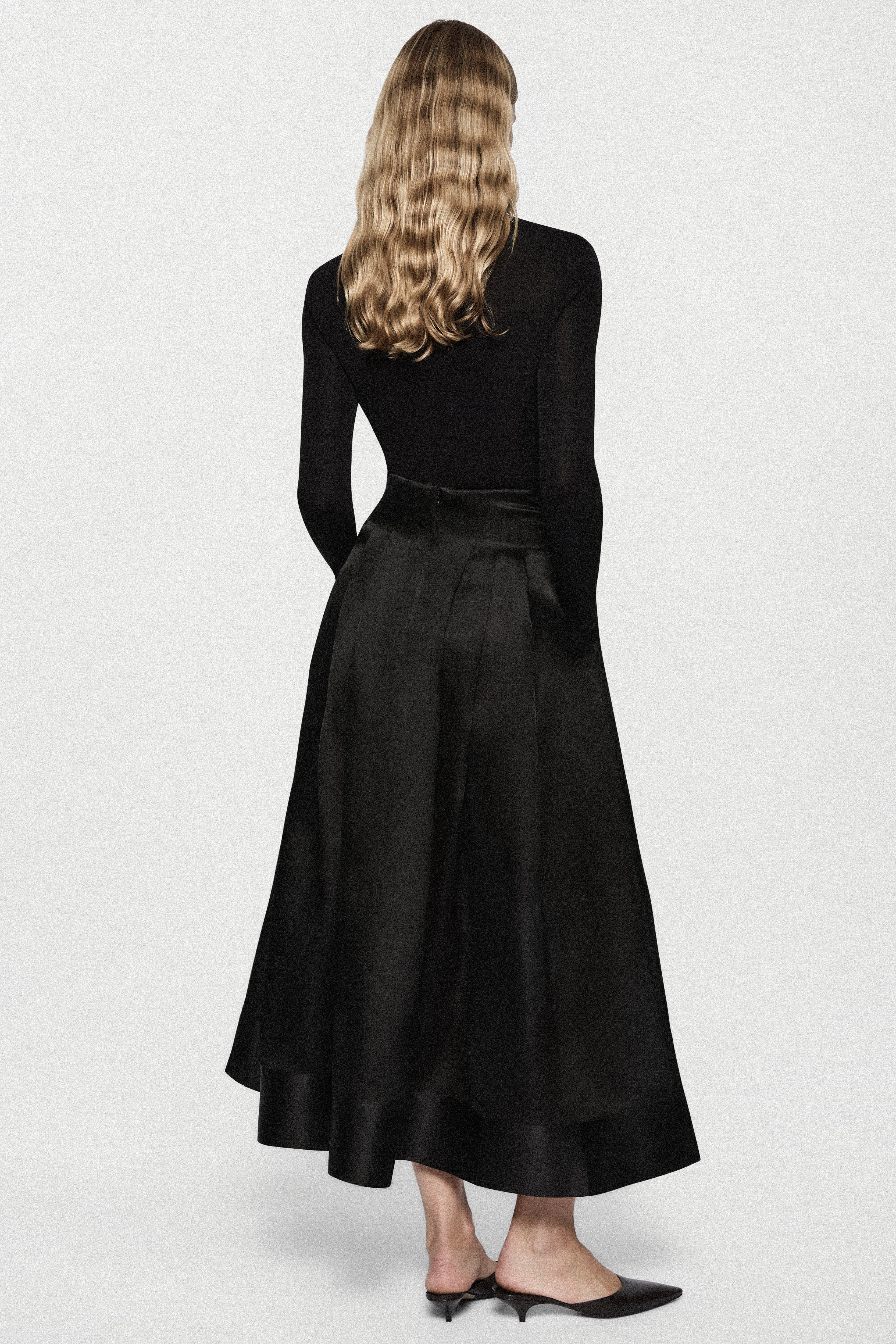 Black long-sleeve twist jersey top, back view, high ruched neckline