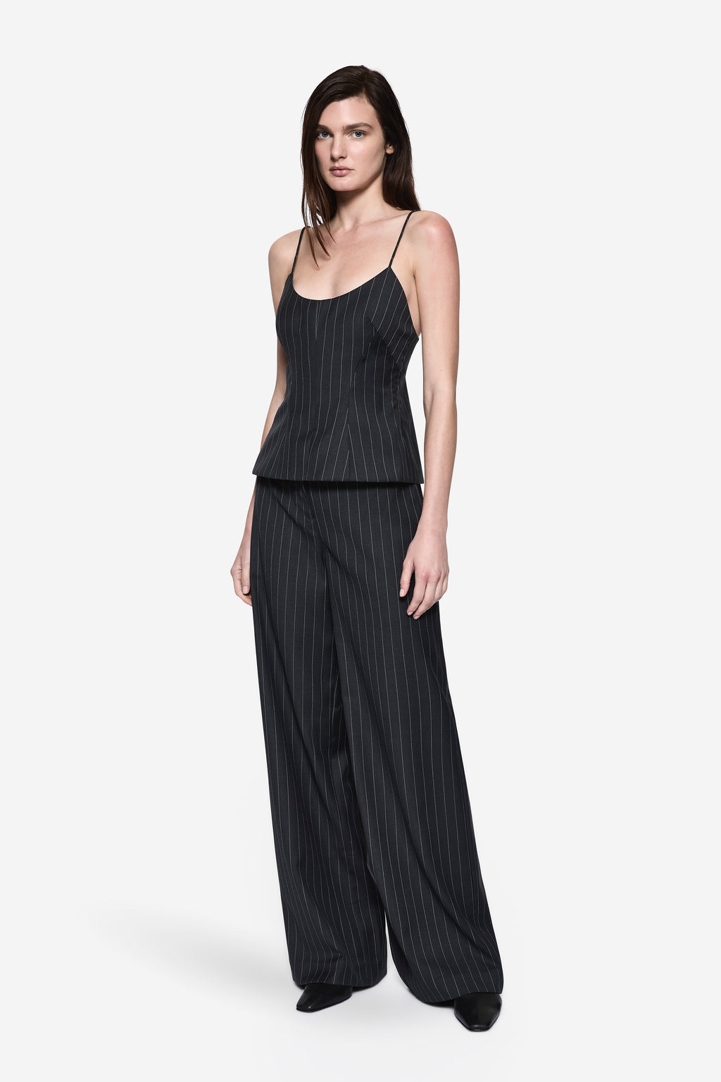 Front view of charcoal wool tailored pinstripe pants with relaxed wide legs