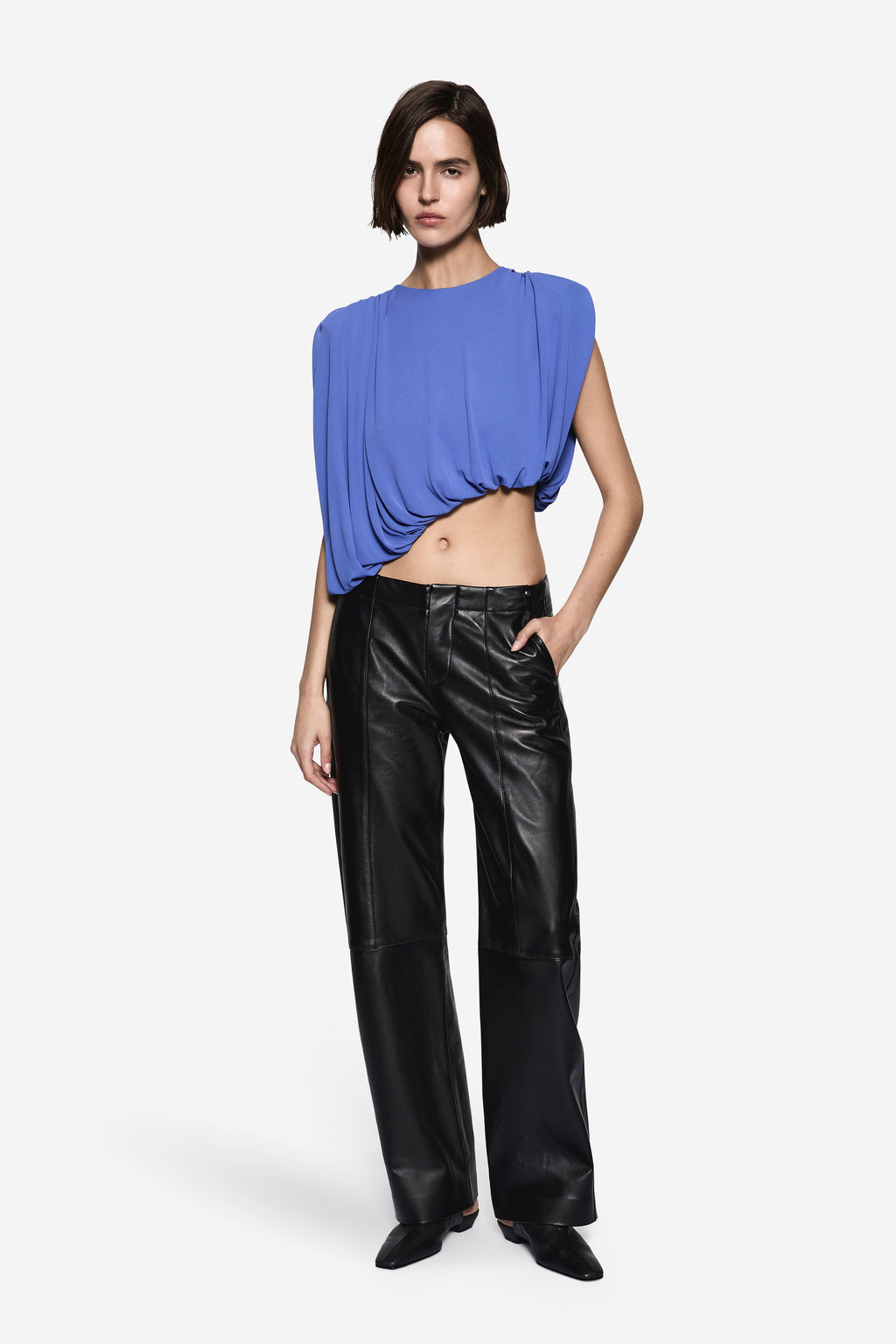 Black leather high-rise wide-leg pants with stitched waistband and side pockets