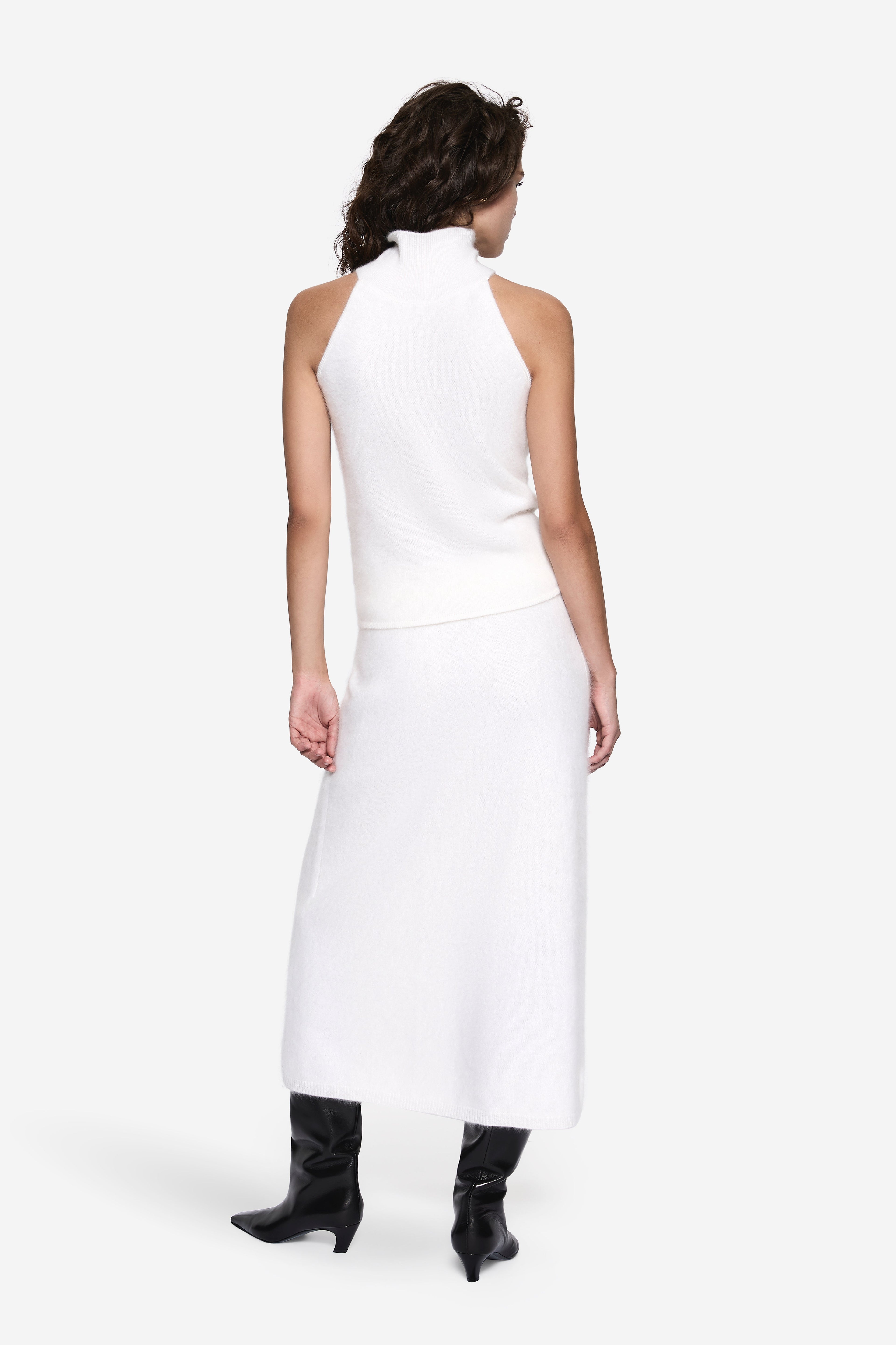 Brushed cashmere midi skirt in winter white, back view with smooth, straight drape