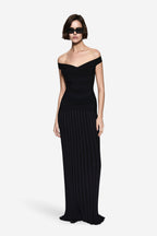Black off-shoulder bandage knit dress with fitted bodice and ribbed long skirt