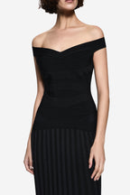 Black off-shoulder knit dress with diagonal bandage-look seams and ribbed skirt