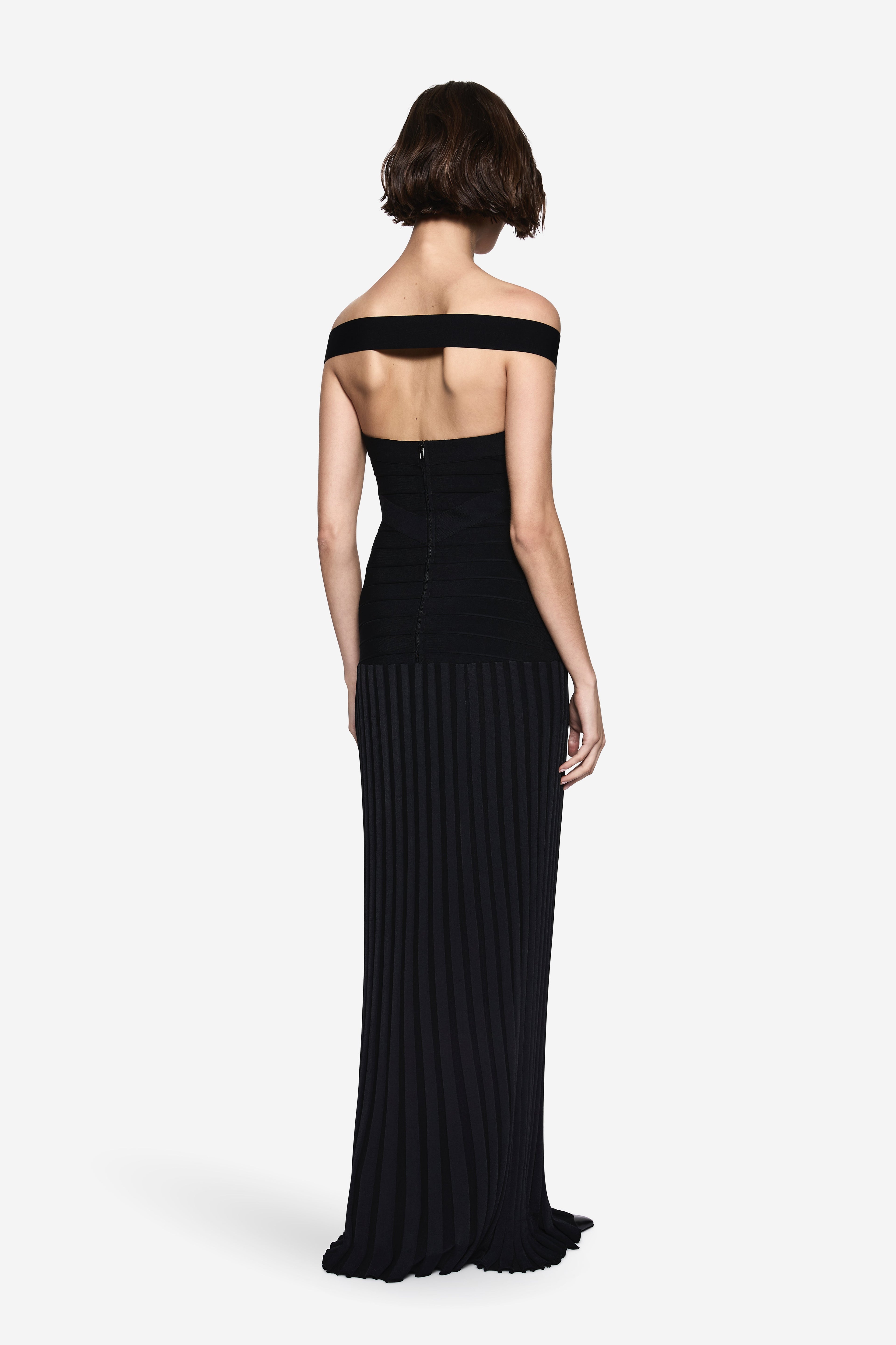 Black off-shoulder bandage knit dress, scooped back with fitted ribbed maxi skirt