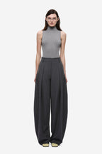 Dark grey high-rise wide-leg pants with pleated front and belt loops