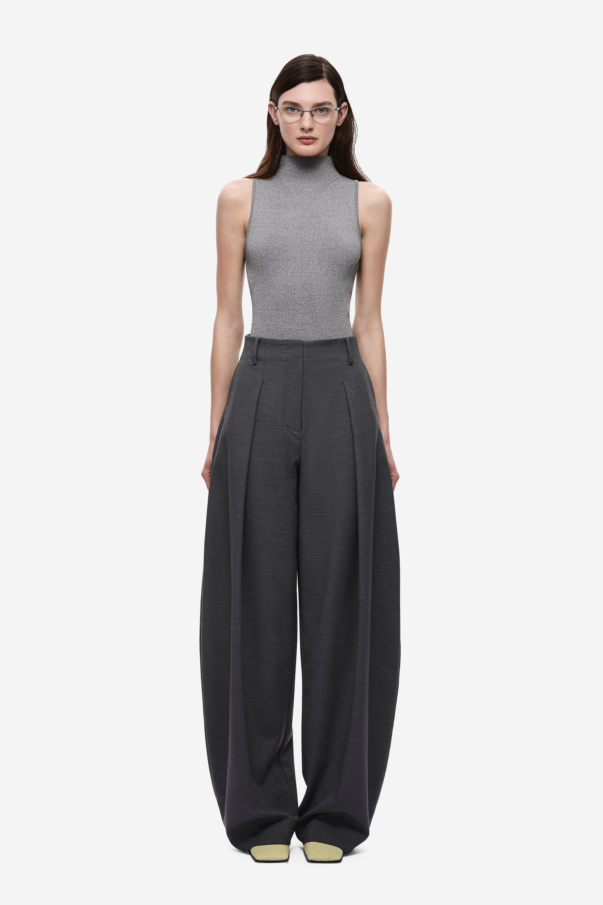 Dark grey high-rise wide-leg pants with pleated front and belt loops