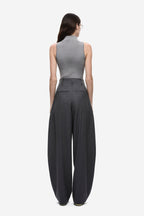 Back view of dark grey high-rise wide-leg pants with pleated waist