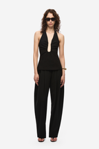 Black halter-neck top with keyhole neckline and slightly flared hem