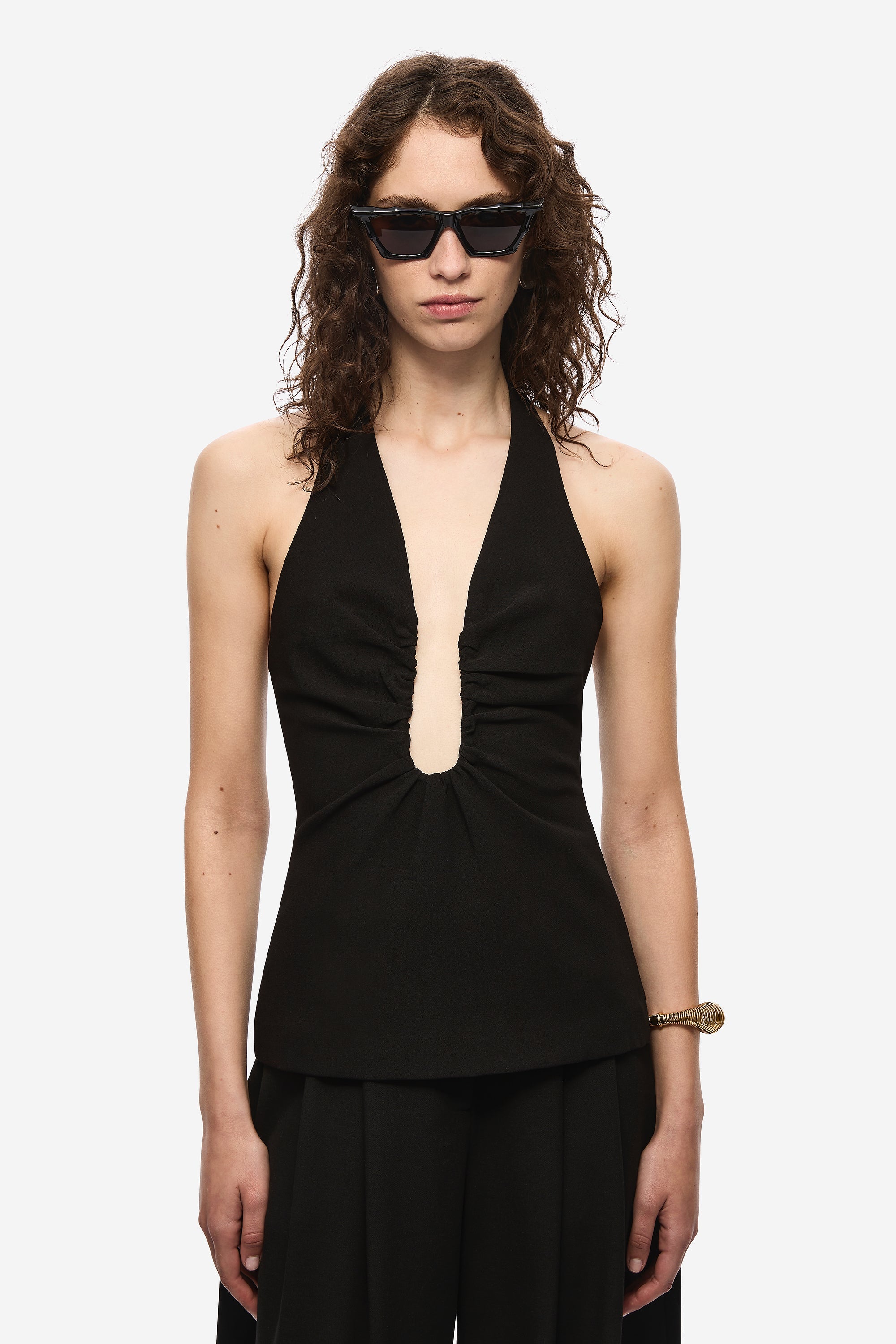 Black sleeveless halter top with keyhole neckline