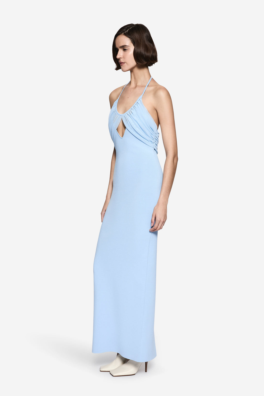 Pastel blue knit maxi dress, draped halter straps and open back detail
