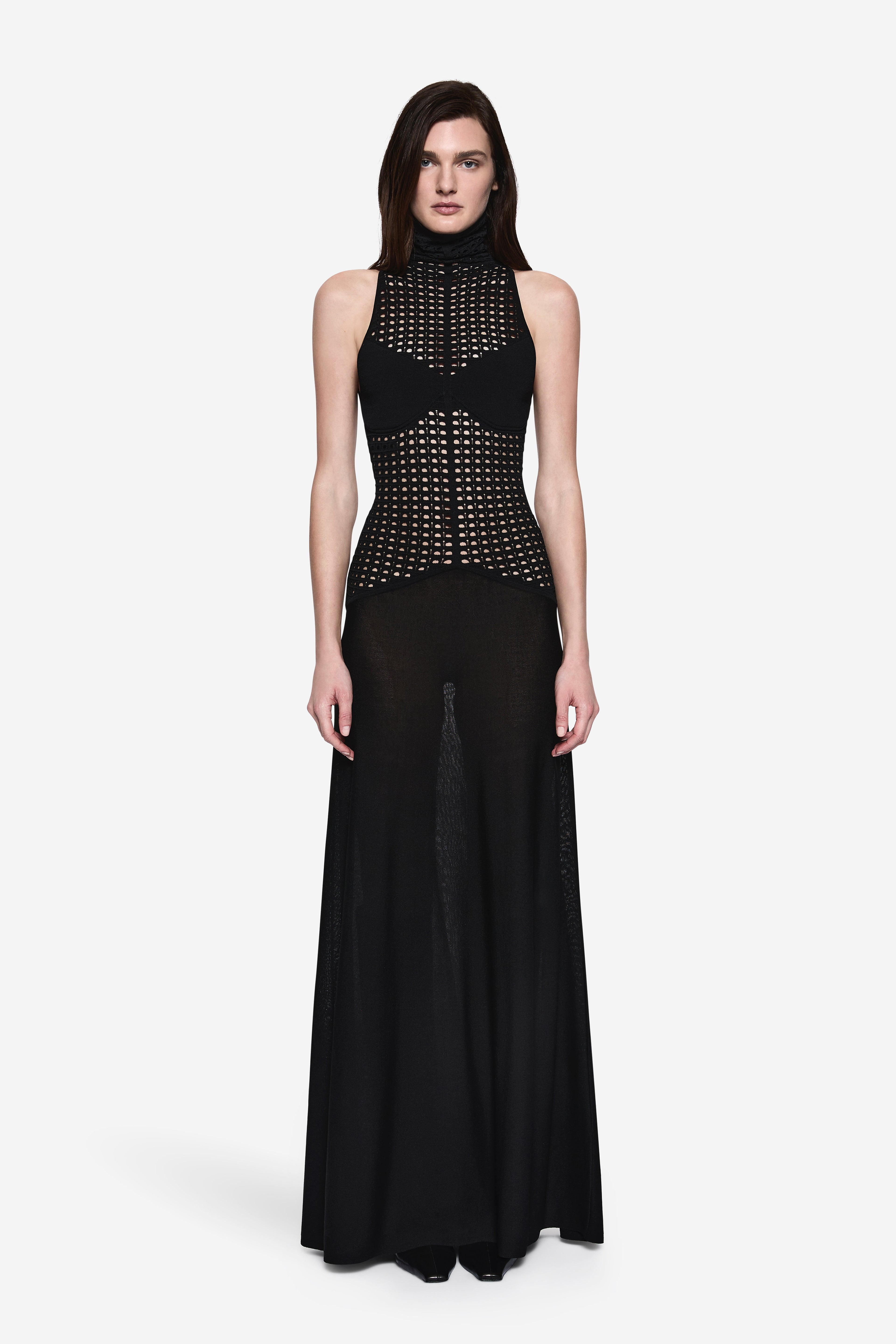 Black sleeveless knit maxi dress with high neck and studded mesh panel
