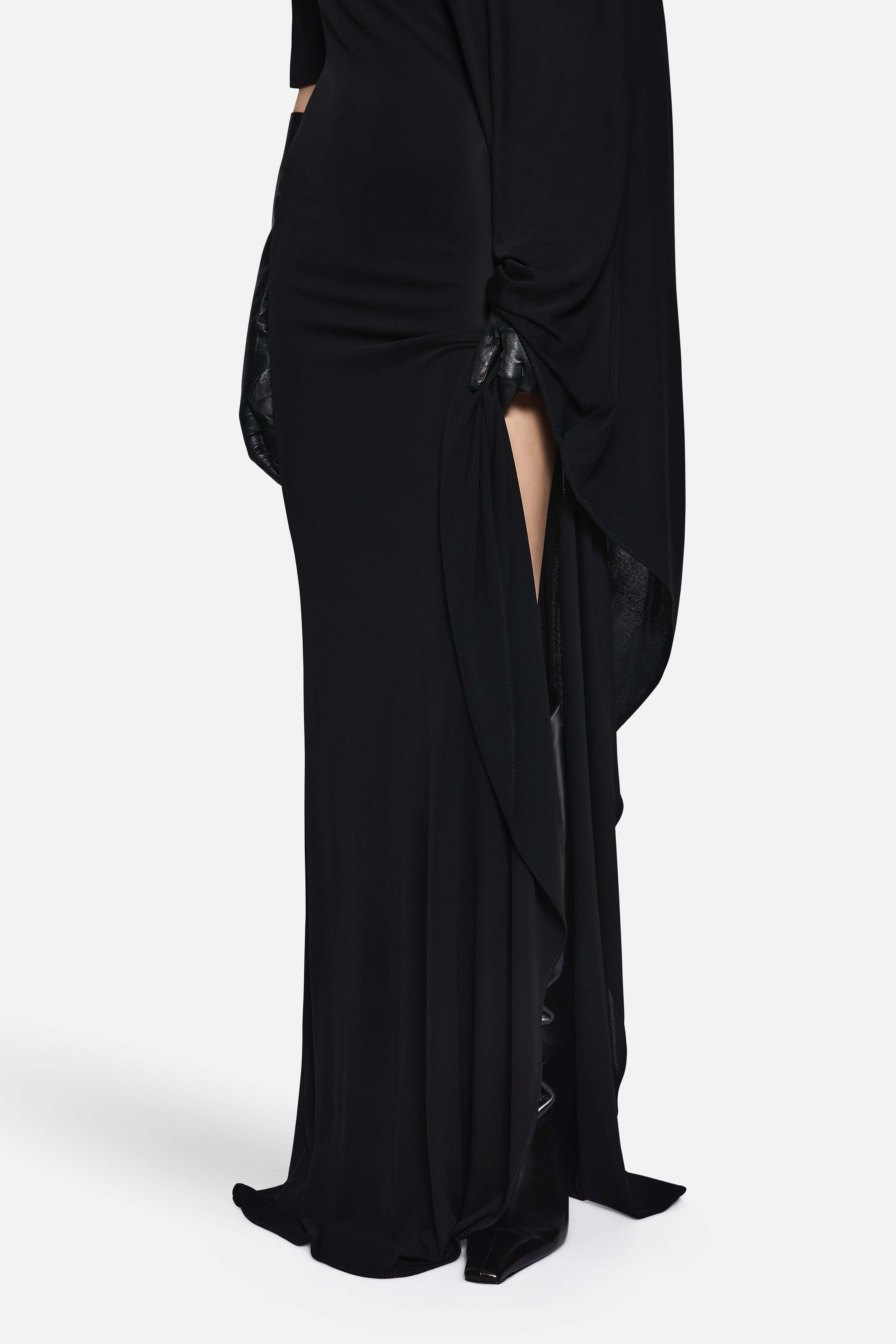 Black jersey maxi dress with ruched drape, side slit, and layered skirt detail