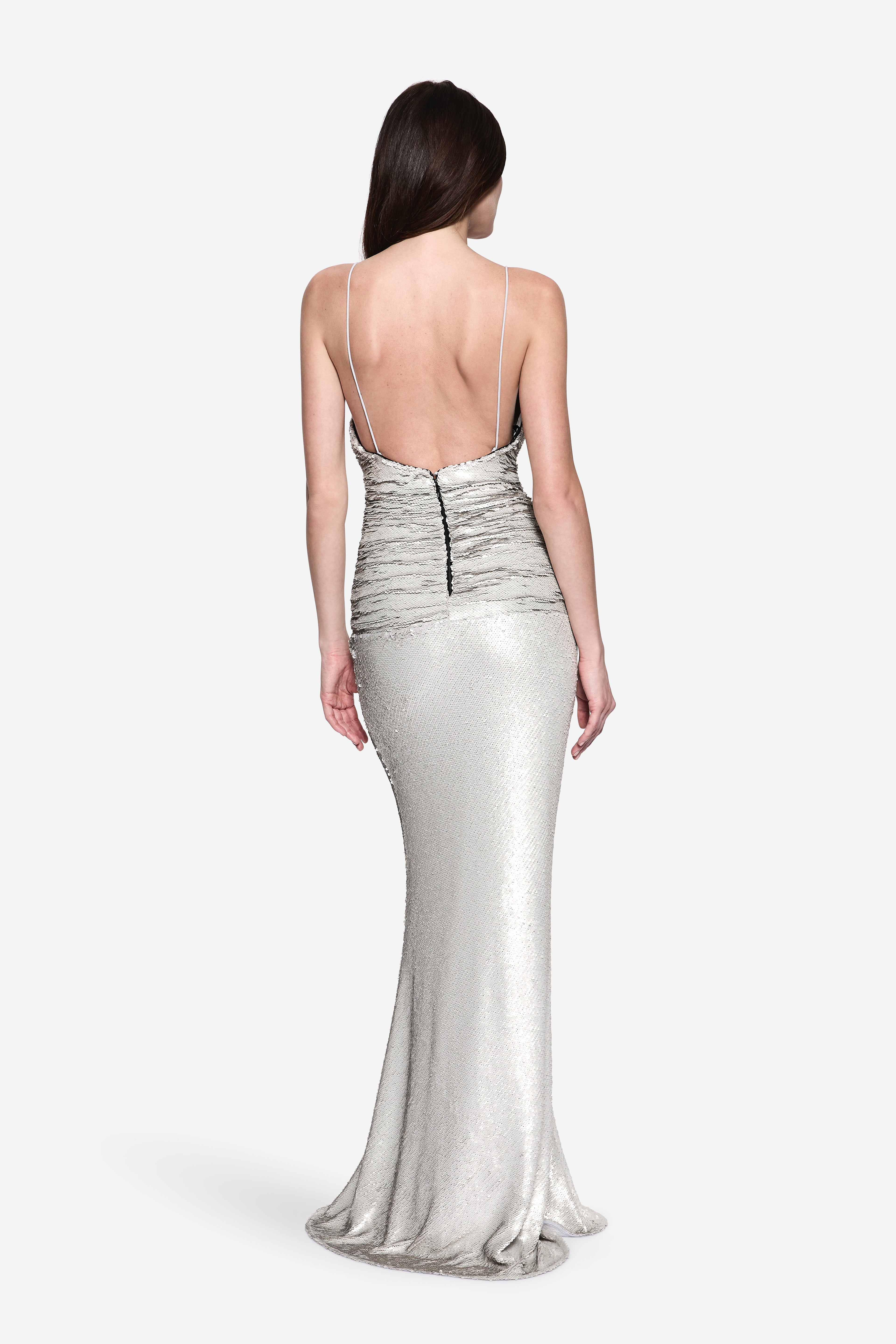 Silver sequin backless evening dress with low V back and fitted mermaid silhouette