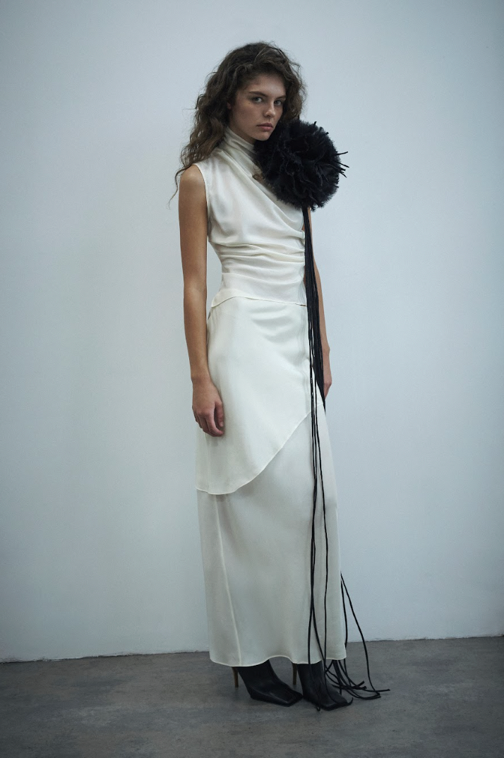 Winter white bias-cut silk skirt with angled side drape, long midi length