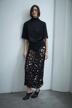 Black crochet midi skirt with cutout lattice pattern and straight pencil fit