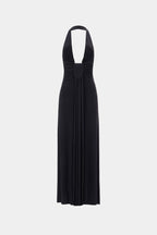 Black halter-style deep V cupro dress with ruched center and long pleated skirt