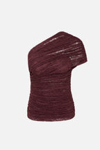 Currant maroon one-shoulder lace top with ruched texture and draped sleeve