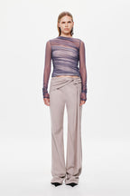 Stone wide-leg suiting pants with draped, knotted waist tie on model.