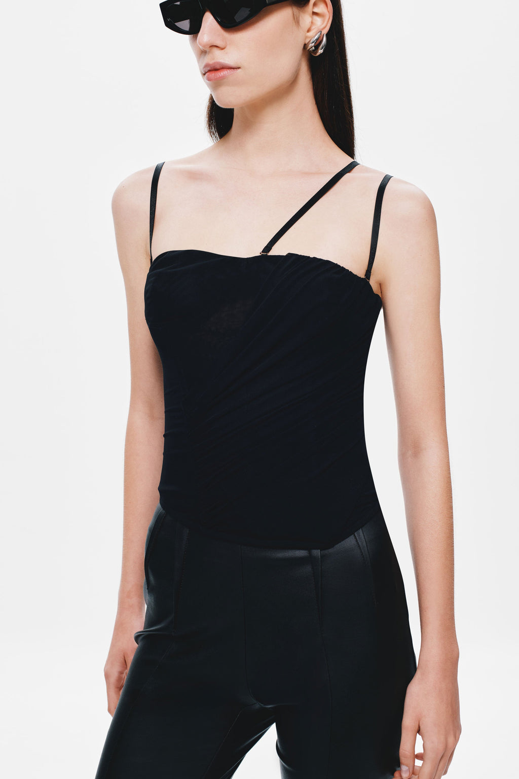 Black mesh corset top close-up with sweetheart neckline and narrow shoulder straps